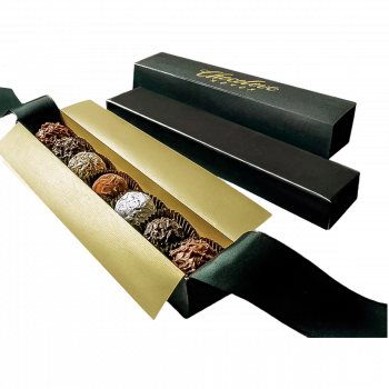 Chocolove Artisanal Truffles gift box, opened showing seven indulgent handcrafted truffles nestled in an elegant black gift box