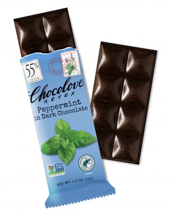 A Chocolove Peppermint in Dark Chocolate bar is partially unwrapped, showing rich dark chocolate squares with embossed heart designs. The wrapper is a cool peppermint-blue color with an elegant, vintage-inspired design. It features an image of fresh peppermint leaves, emphasizing the crisp, refreshing flavor. A 55% cocoa label is displayed in the top left corner, accompanied by a stamp-style illustration of peppermint plants and a red Belgian Chocolate seal near the top. The chocolate’s glossy surface highlights its premium Belgian quality.