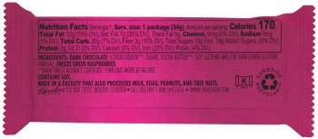 The back of a Chocolove Raspberries in Dark Chocolate mini bar package displays a nutritional facts panel in black text on a raspberry-pink background. It lists details such as 170 calories per serving, 12g of total fat, and 15g of total sugars. The ingredients include dark chocolate and freeze-dried raspberries. An allergen warning states the product contains soy and is manufactured in a facility that processes milk, eggs, peanuts, and tree nuts.