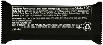 The back of the Chocolove Almonds & Sea Salt in Strong Dark Chocolate mini bar package displays a nutrition facts panel in white text on a black background. It lists details such as 190 calories per serving, 16g of total fat, and 9g of total sugars. The ingredients include dark chocolate, almonds, and sea salt. An allergen warning states that the product contains almonds and soy and is manufactured in a facility that processes milk, eggs, peanuts, and tree nuts.