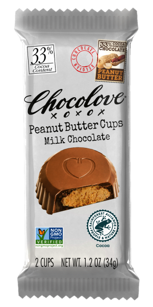 Chocolove Peanut Butter Cups in Milk Chocolate with 33% cocoa content, shown in silver packaging. Features an image of a peanut butter cup cut open to reveal its creamy center, along with Non-GMO Project Verified and Rainforest Alliance Certified cocoa logos. Net weight is 1.2 oz (34g), contains 2 cups.