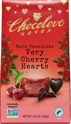 Front of the Chocolove Very Cherry Hearts gift bag. The red and pink packaging features romantic rose designs and charming heart shapes, showcasing the decadent dark chocolate hearts with cherry purée filling. Text highlights 'Dark Chocolate Very Cherry Hearts,' 'Individually Wrapped,' and certification logos, including Non-GMO Project and Rainforest Alliance.