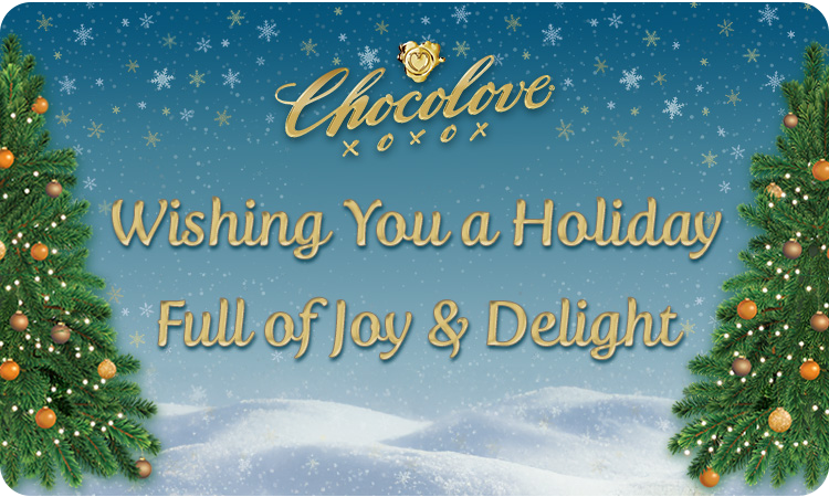 Chocolove digital gift card with a snowy winter scene and decorated evergreen trees on both sides. Features the gold Chocolove logo with a wax seal heart and the message “Wishing You a Holiday Full of Joy & Delight.” This is a digital gift card, not a physical item.