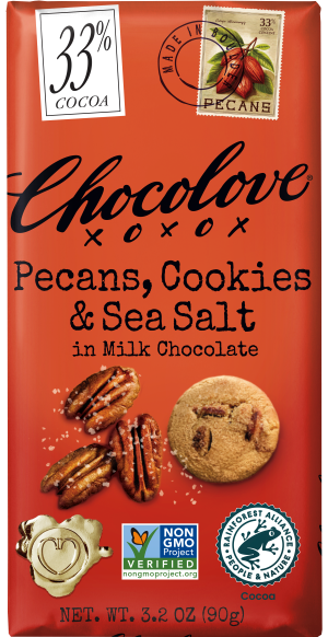 A Chocolove chocolate bar with an orange wrapper. The packaging highlights '33% Cocoa' in a white box, a stamp illustration of pecans, and bold black lettering that reads 'Pecans, Cookies & Sea Salt in Milk Chocolate.' The lower part showcases pecans and a cookie with visible pecan pieces, both sprinkled with sea salt. The bar is Non-GMO Project Verified and Rainforest Alliance Certified.
