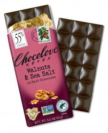 Chocolove Walnuts & Sea Salt in Dark Chocolate bar (55% cocoa) partially unwrapped, revealing its rich dark chocolate with a smooth, glossy surface. The packaging features images of walnuts, a gold foil wrapper, and certification logos, including Non-GMO Project Verified and Rainforest Alliance Certified